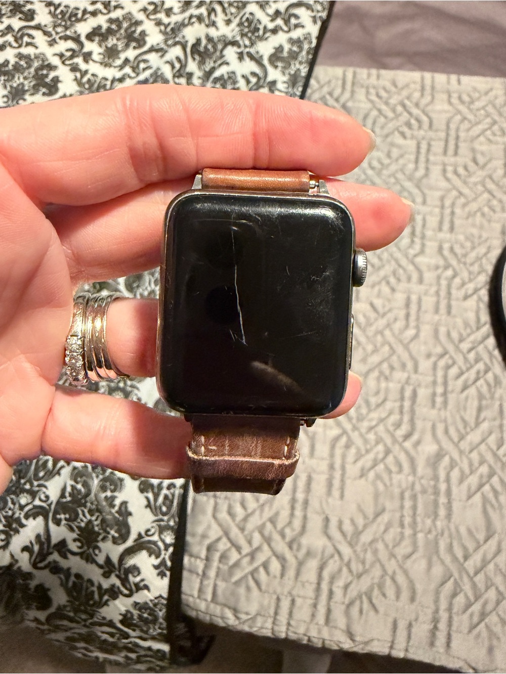 Apple Smartwatch with Brown Leather Strap and Black Screen